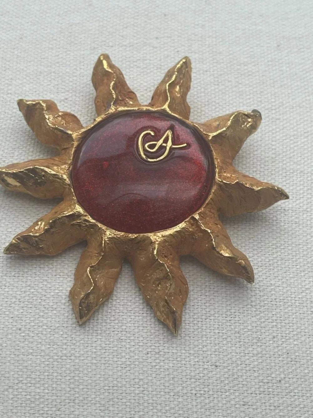 Christian Lacroix Gold-Tone Sun Brooch W/ Red Resin Center & Golden Logo